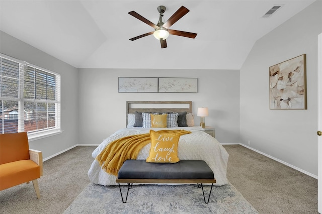 bedroom featuring baseboards, visible vents, ceiling fan, vaulted ceiling, and carpet flooring