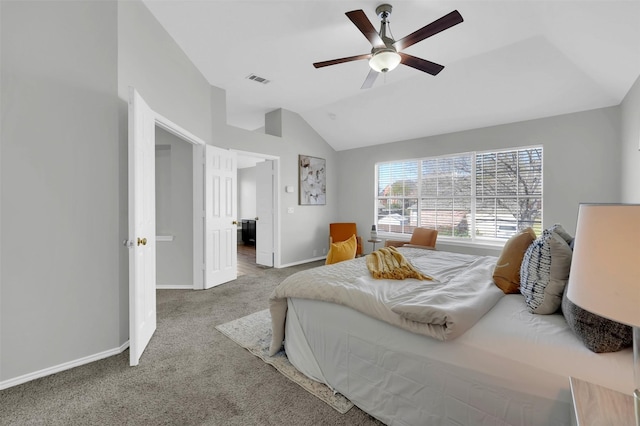 carpeted bedroom featuring a ceiling fan, vaulted ceiling, visible vents, and baseboards