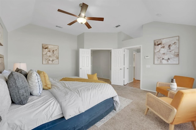 bedroom with visible vents, ceiling fan, and lofted ceiling