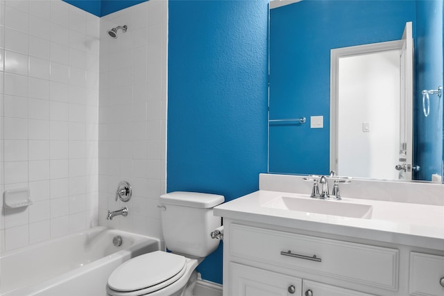 bathroom featuring vanity, toilet, and  shower combination