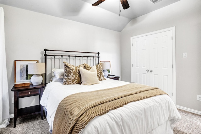 bedroom with visible vents, baseboards, ceiling fan, lofted ceiling, and carpet flooring