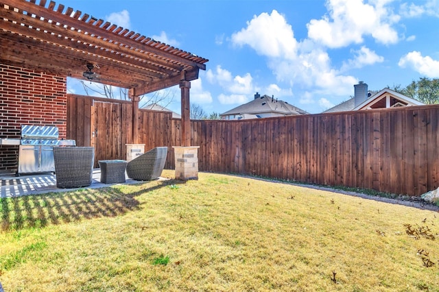 view of yard featuring a pergola and a fenced backyard