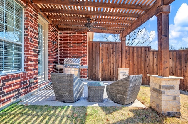 view of patio / terrace with a fenced backyard and a pergola