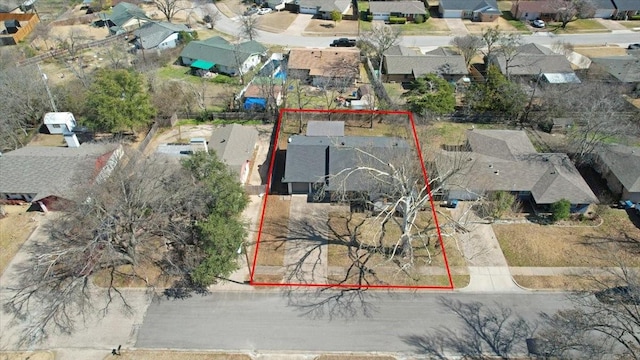 birds eye view of property with a residential view