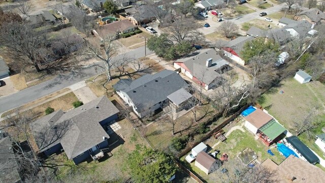 birds eye view of property with a residential view