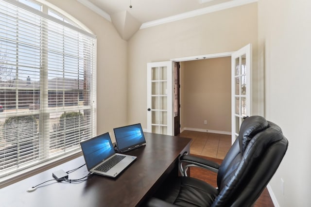 office with french doors, baseboards, and crown molding