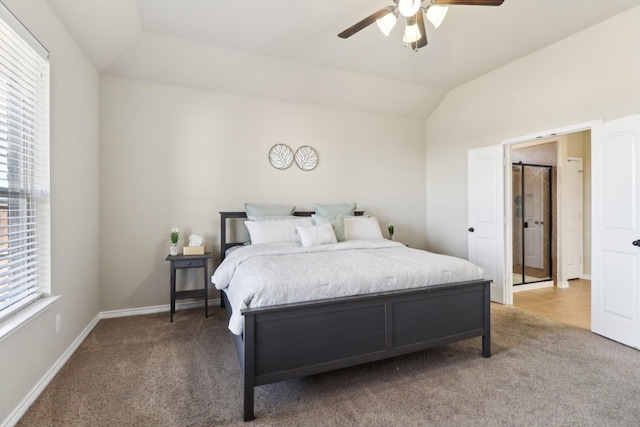 bedroom with a ceiling fan, lofted ceiling, light colored carpet, and baseboards