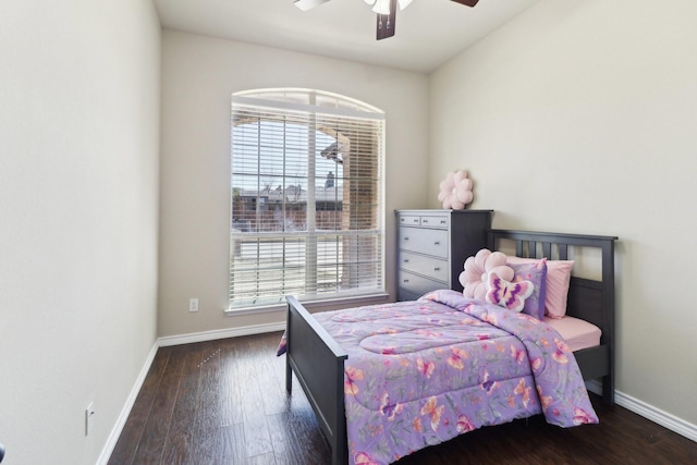 bedroom with hardwood / wood-style flooring, baseboards, and ceiling fan