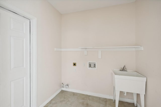 clothes washing area with laundry area, hookup for a washing machine, electric dryer hookup, and baseboards