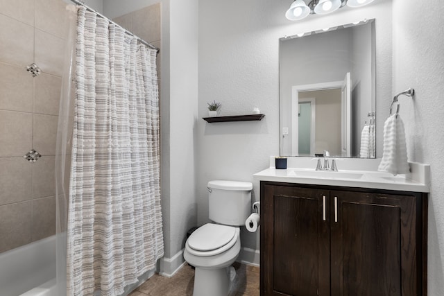 bathroom with tile patterned flooring, baseboards, toilet, shower / bath combination with curtain, and vanity