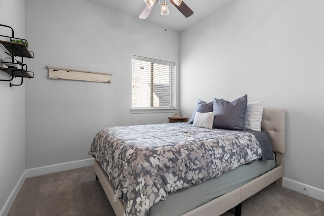 bedroom featuring baseboards and carpet floors