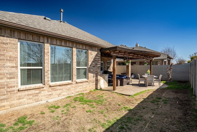 view of yard featuring an outdoor living space, a patio area, a pergola, and a fenced backyard