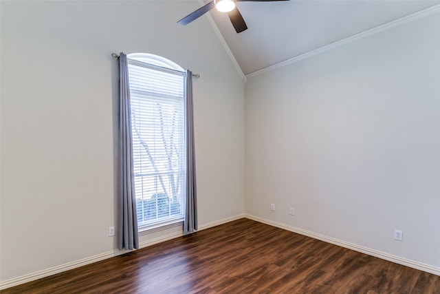 empty room featuring ceiling fan, dark wood-type flooring, crown molding, and vaulted ceiling