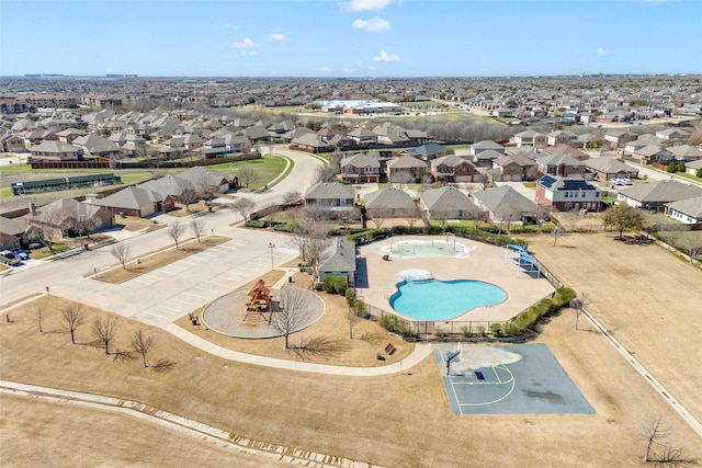 birds eye view of property with a residential view