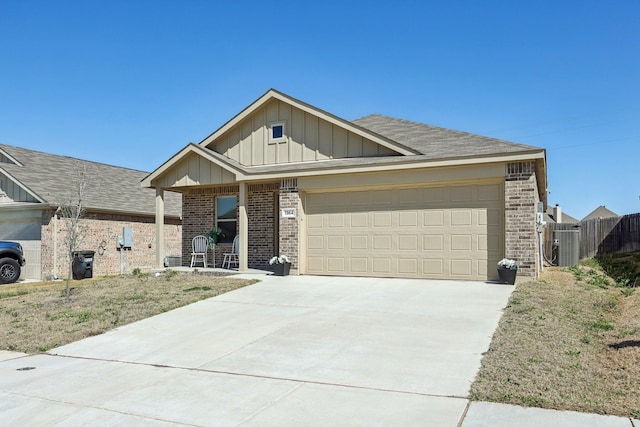 ranch-style house featuring board and batten siding, a garage, brick siding, and driveway