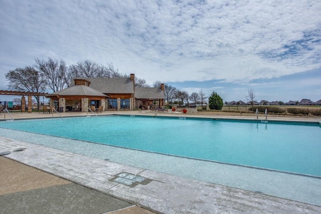 community pool featuring a patio