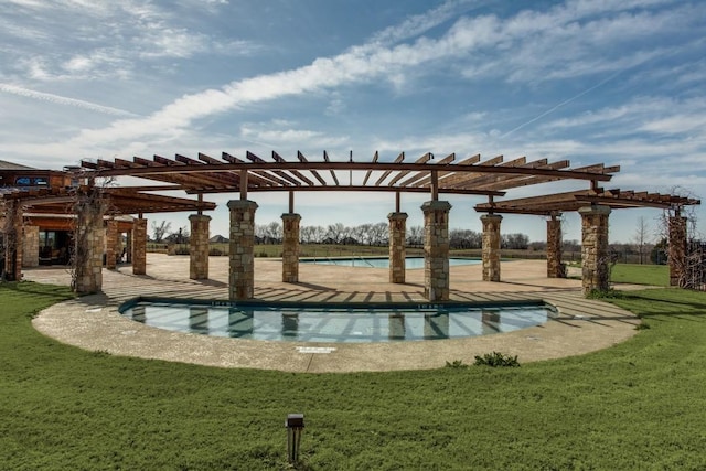 view of pool with a pergola and a yard