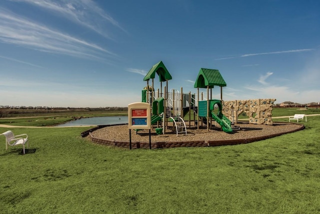 community playground featuring a lawn