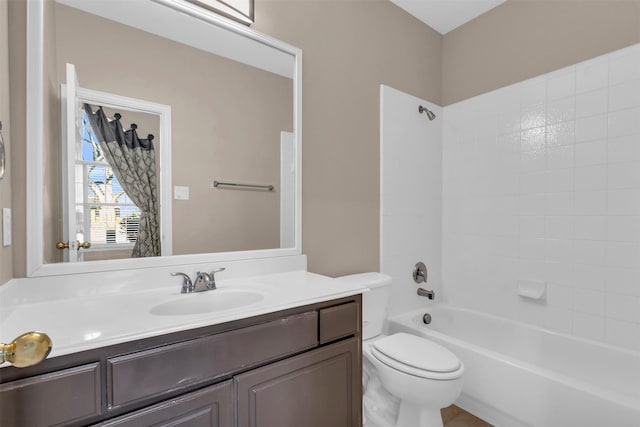 full bathroom featuring shower / bathtub combination, toilet, and vanity