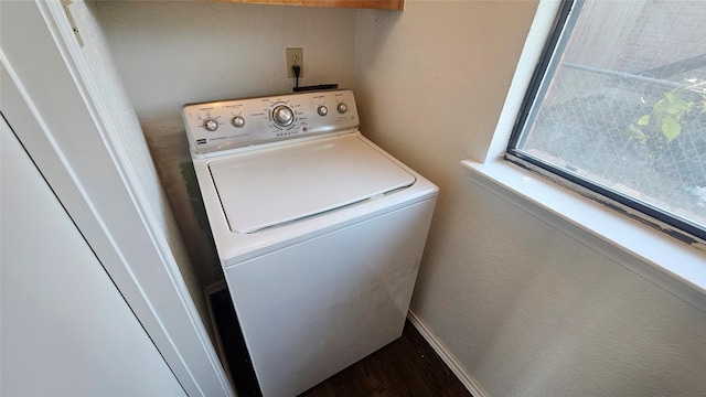 laundry room with laundry area, washer / clothes dryer, baseboards, and a textured wall