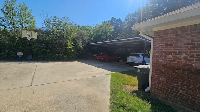 exterior space with a carport and driveway