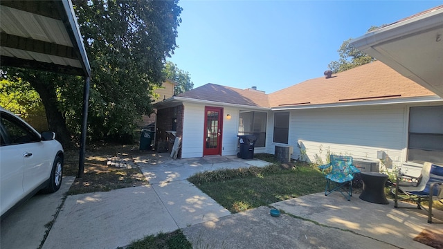 exterior space with cooling unit and a patio