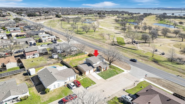 aerial view featuring a residential view and a water view