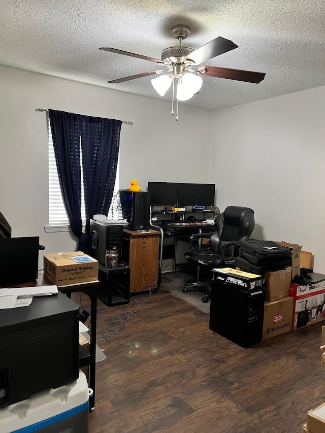 office space with ceiling fan, a textured ceiling, and wood finished floors