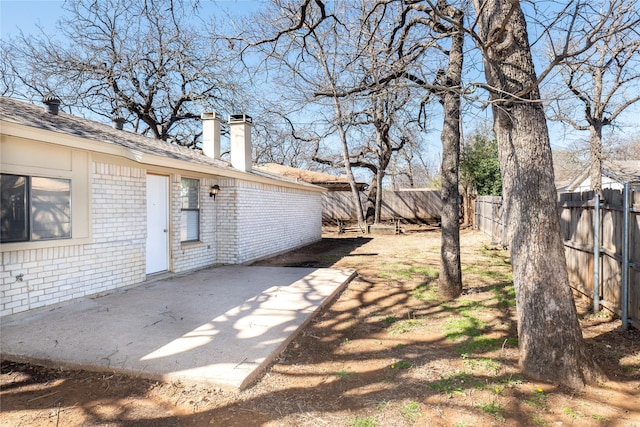 view of yard with a patio area and fence