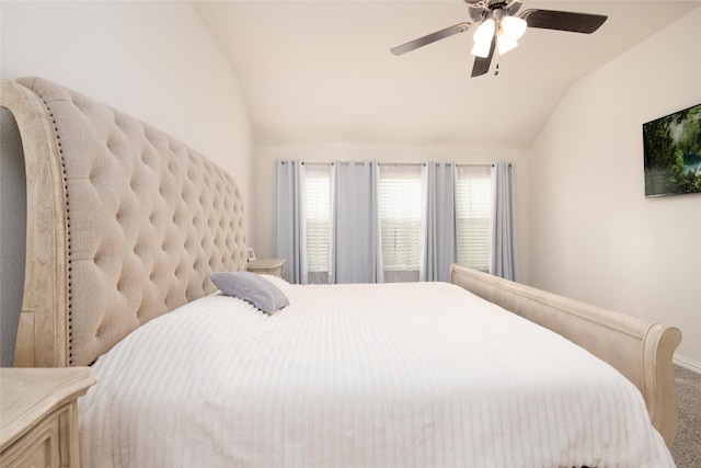 7409 Autumn Grove Ln, Ponder, TX 76259 - carpeted bedroom featuring lofted ceiling, a ceiling fan, and baseboards