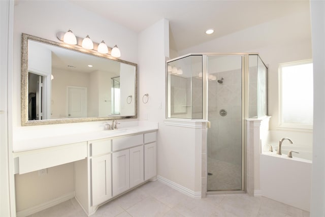 7409 Autumn Grove Ln, Ponder, TX 76259 - bathroom with a stall shower, vanity, a bath, tile patterned floors, and baseboards