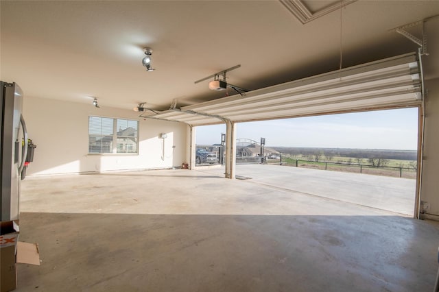 7409 Autumn Grove Ln, Ponder, TX 76259 - garage featuring a garage door opener