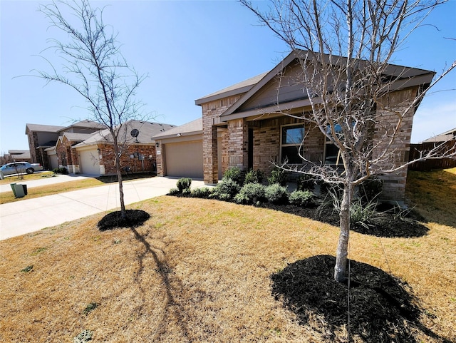 view of front facade featuring brick siding, driveway, an attached garage, and a front yard