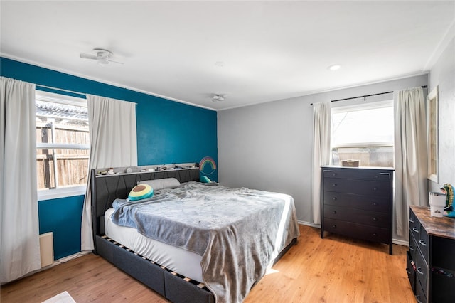 bedroom featuring light wood finished floors