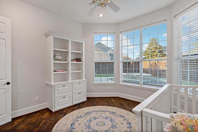 bedroom with recessed lighting, dark wood-style floors, and baseboards