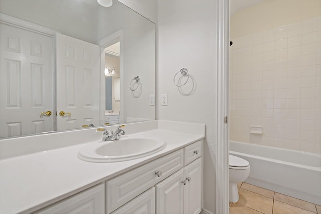 full bathroom with tile patterned flooring, toilet, vanity, and shower / bath combination