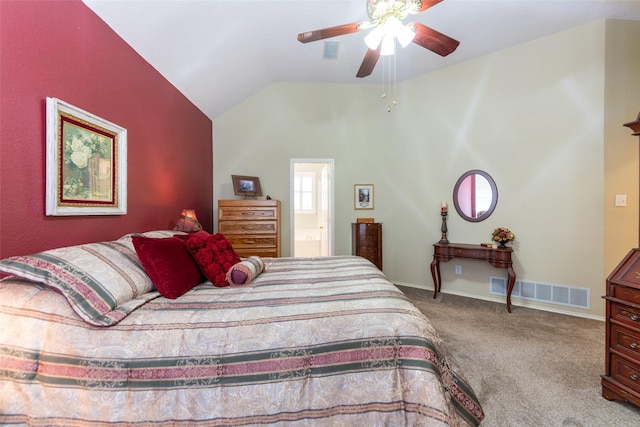 carpeted bedroom with visible vents, lofted ceiling, baseboards, and ceiling fan