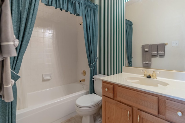 bathroom with vanity, toilet, shower / bath combo with shower curtain, and tile patterned flooring