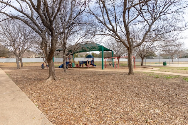 exterior space featuring playground community and fence