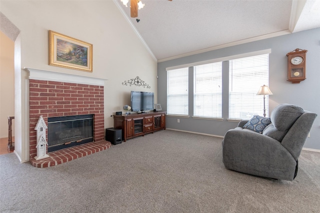 carpeted living area featuring baseboards, a fireplace, ornamental molding, vaulted ceiling, and a textured ceiling