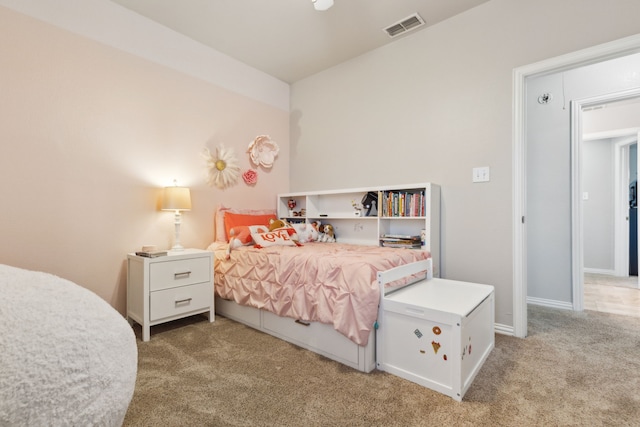 carpeted bedroom with visible vents