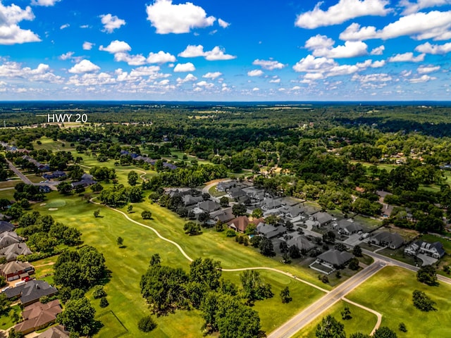 drone / aerial view with a residential view and view of golf course