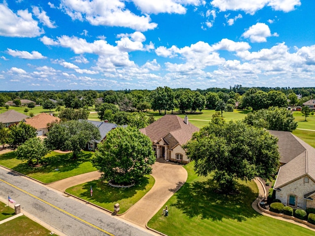 birds eye view of property with a residential view