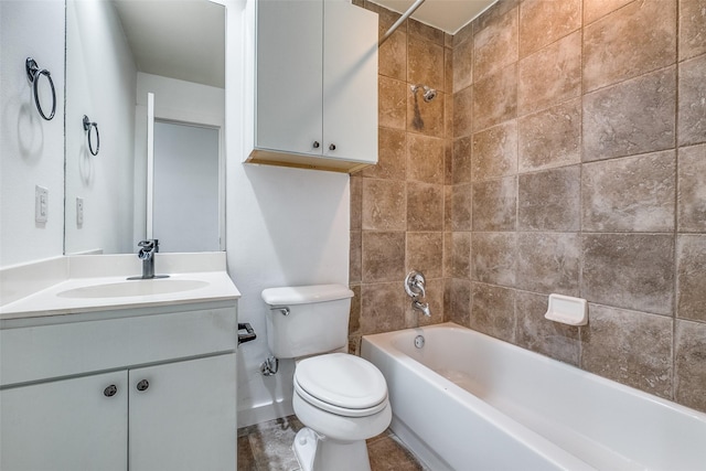 bathroom featuring vanity, shower / tub combination, and toilet