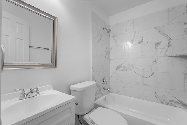 full bathroom featuring vanity, toilet, and washtub / shower combination