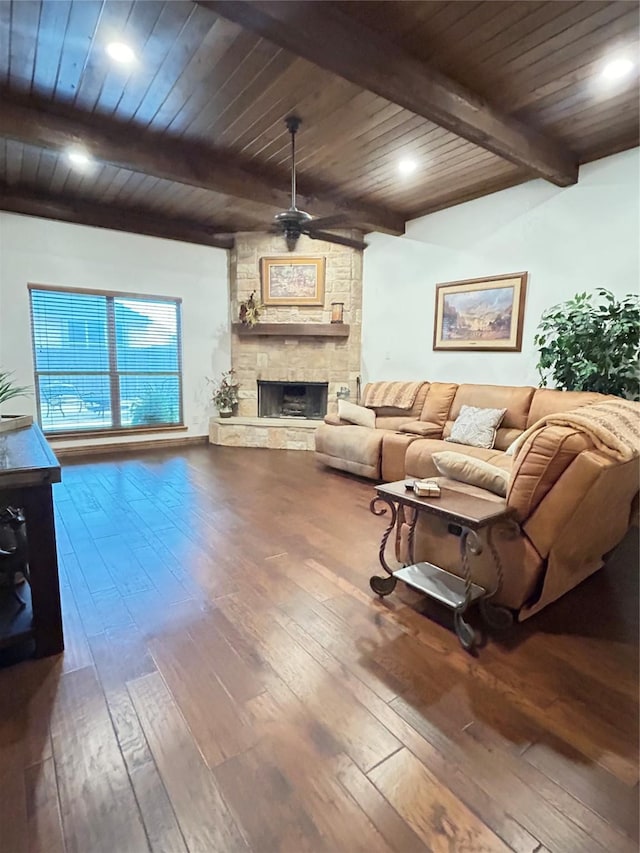 living area featuring a fireplace, wood ceiling, ceiling fan, and wood-type flooring