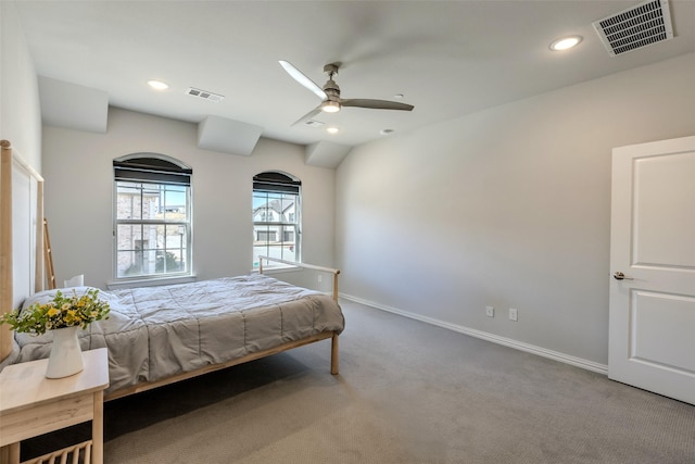 bedroom with visible vents, baseboards, and carpet