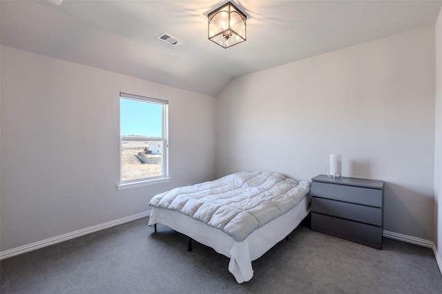 bedroom featuring visible vents, baseboards, and carpet flooring