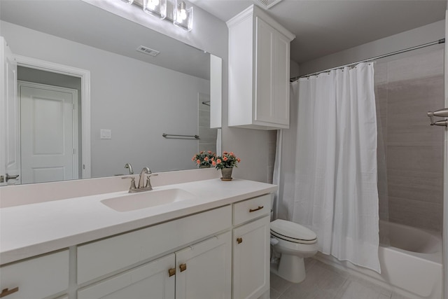 bathroom featuring tile patterned floors, visible vents, toilet, shower / bath combo, and vanity