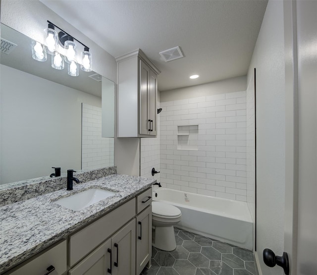 full bath with tile patterned flooring, toilet, vanity, and visible vents